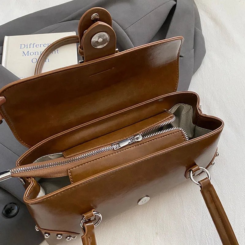 Autumn And Winter New Retro Motorcycle Armpit Bag Casual Rivet Women'S Shoulder Bag Commuting Bag Pu Stick Bag