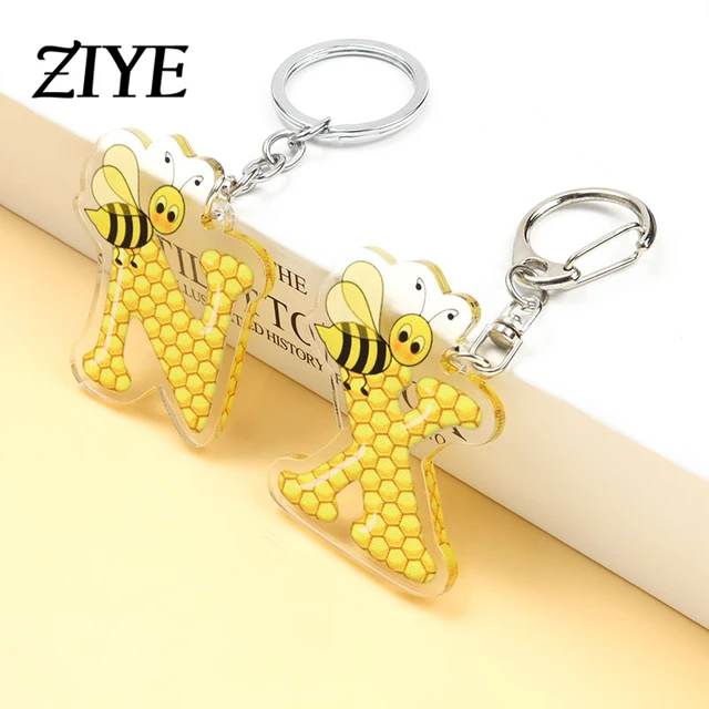 Niedliche Honigbiene Waben Acryl Schlüssel anhänger gelb A-Z Anfangs  buchstaben Anhänger Schlüssel ringe für Frauen Mann Handtasche Schmuck  Zubehör - AliExpress