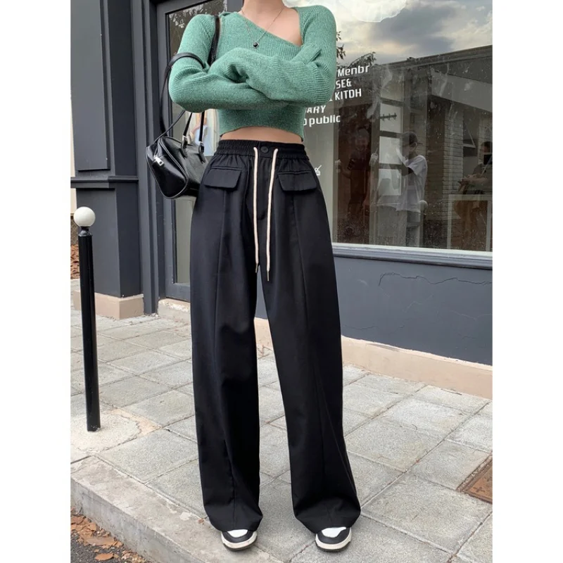 

Elastic waist drawcord design High waist loose wide leg pants Casual pants