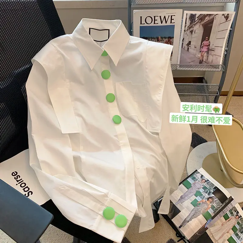 

White chic button polo collar blouse women 2023 spring new loose casual design sense niche long sleeved blouse shirt female