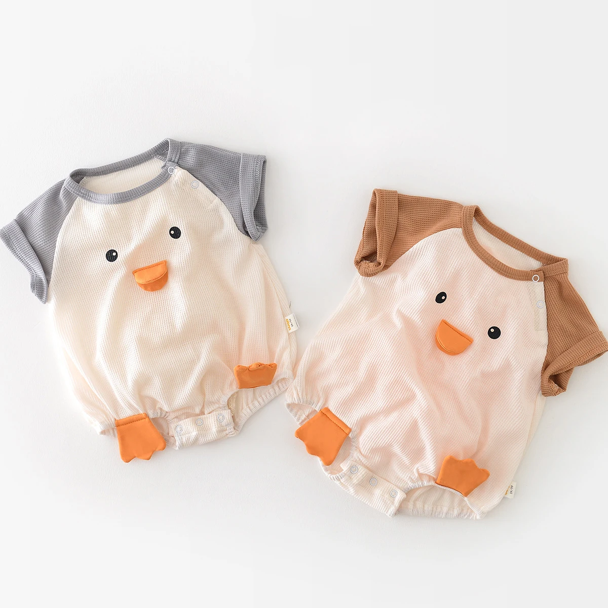 

Baby Cartoon Bodysuits Newborn Boys Summer Clothes Short Sleeve One Pieces Korean Waffle Infant Girl Clothes Cute Duck Jumpsuit