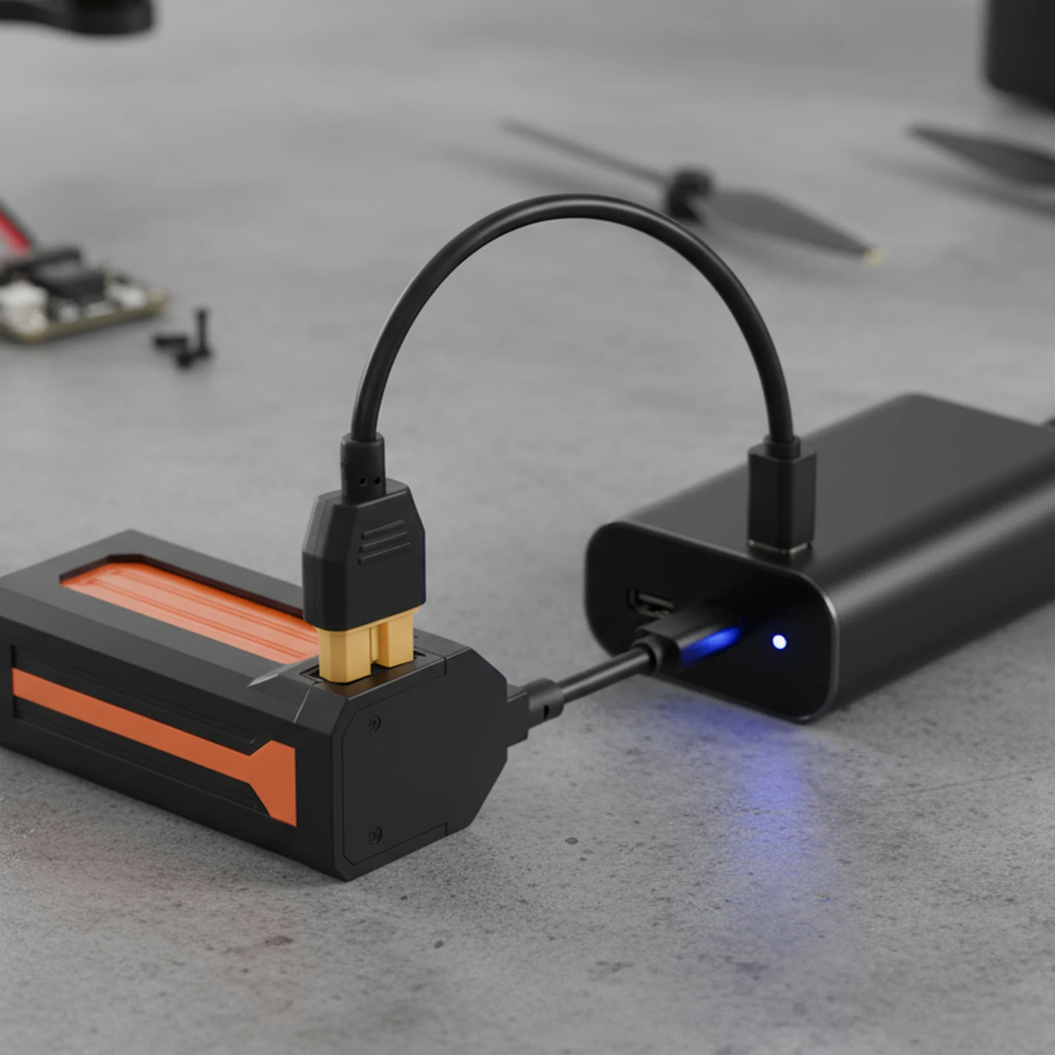 Câble de charge drone USB-C vers XT60 montrant la gaine tressée et les connecteurs