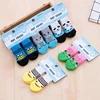 4 Pcs/set of Cute Pet Dog Socks with Printed Non-slip Cat and Puppy Shoes To Protect and Prevent Dirt Warm Pet Socks 2