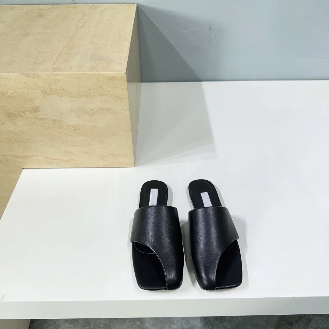 Women's shoes summer new minimalist style leather square head half pack side air fashionable slope heel flat bottom slippers