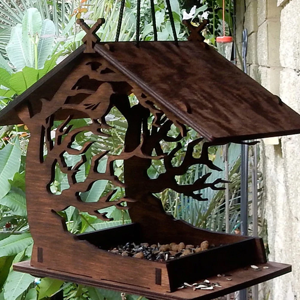 Wooden bird feeder close-up 1