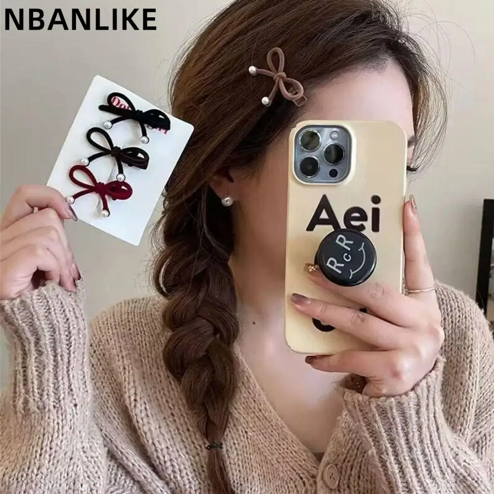 

Korean Style Simple Temperament Bowknot Pearl Red Velvet Side Clip Hair Accessories