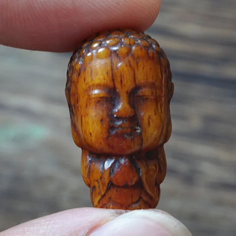 

Make old cow bone carving three-way Buddha head diy Bodhi Buddha beads accessories camel bone integrated three-way Buddha head