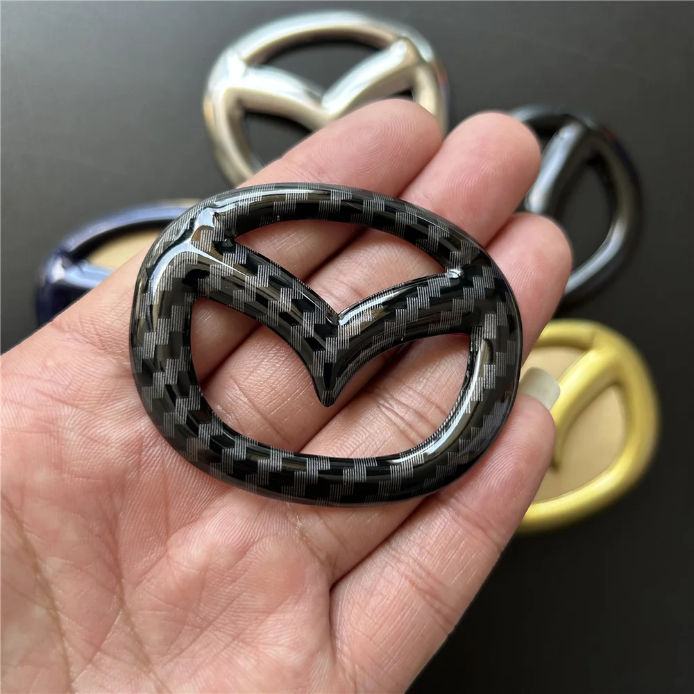 Autoadesivo Del Volante Dell'Automobile Per Mazda 3 Axela 6 Atenza Cx-5 2 Demio Cx-3 Cx-30 Mx5 Cx30 Emblema Decalcomania