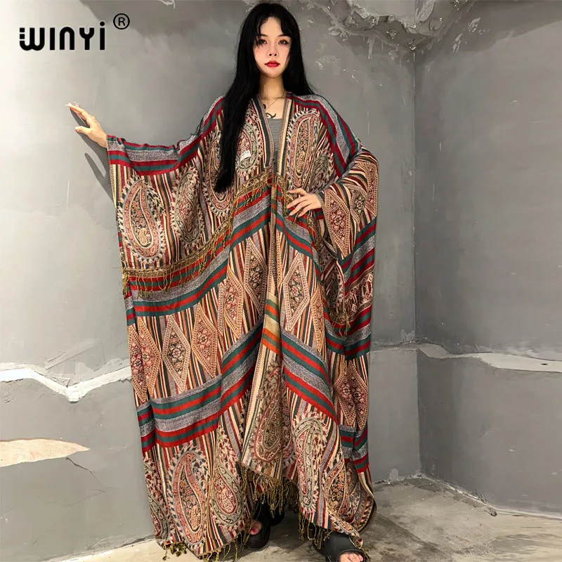 

WINYI Winter Classic cashew print cloak Women High Quality poncho tassels Long OverCoat Thick Warm Female long down coat jacket