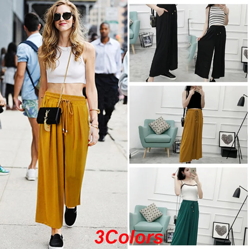 Женские брюки с завышенной талией и широкими штанинами