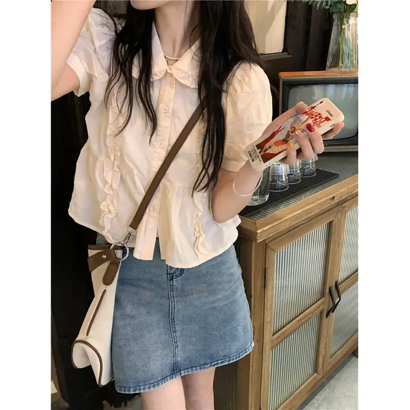 

Korean Style Short Sleeve Shirt Women's Summer 2023 New Cute Youth-Looking Wooden Ear Loose Slimming Col Claudine Top