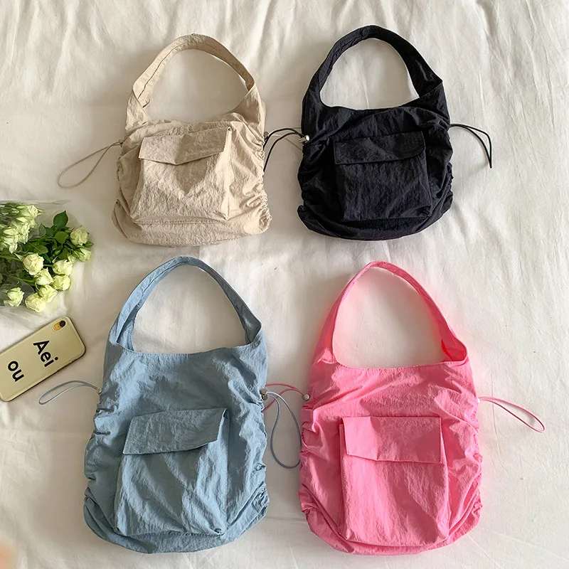 

Ultra Light Designer Handbags For Women 2023 Fashion Hand Bags Nylon Travel Bags Ladies Solid Color Single Shoulder Bucket Bags