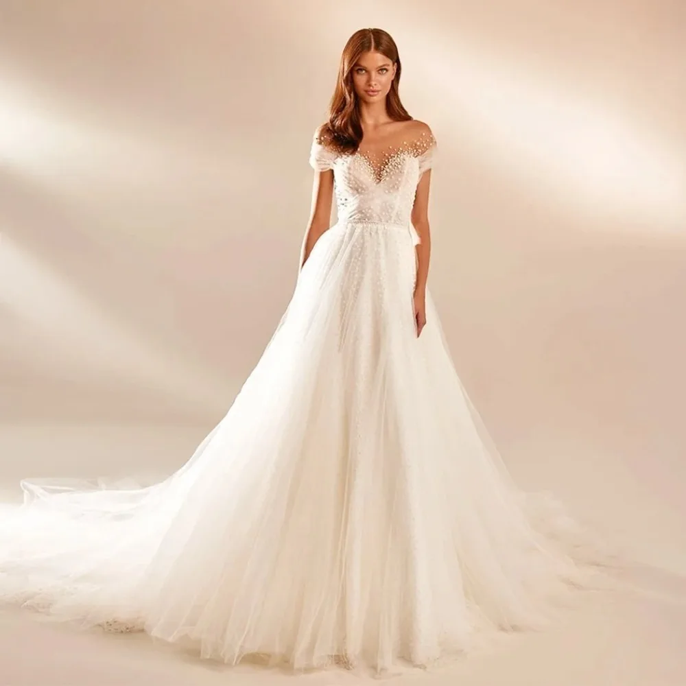 Abiti da Sposa Personalizzati Romantici con Spalle Scoperte e Perline in Tulle 2026 Nuovo Elegante Abito da Sposa a Trapezio con Perline, Balze e Ricami - immagine 4