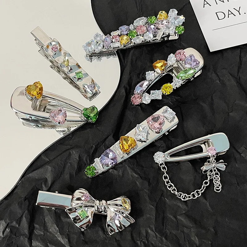 

New Fashion Metal and Colorful Zircon Inlaid Luxury Bowknot Hairpin Irregular Shaped Love Hair Clip