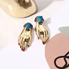 European And American Creative Fashion Hand Shape Simple Exaggerated Earrings Female 2