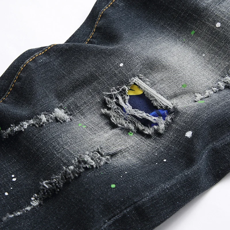 Jeans skinny strappati da uomo Jeans con fori blu Pantaloni