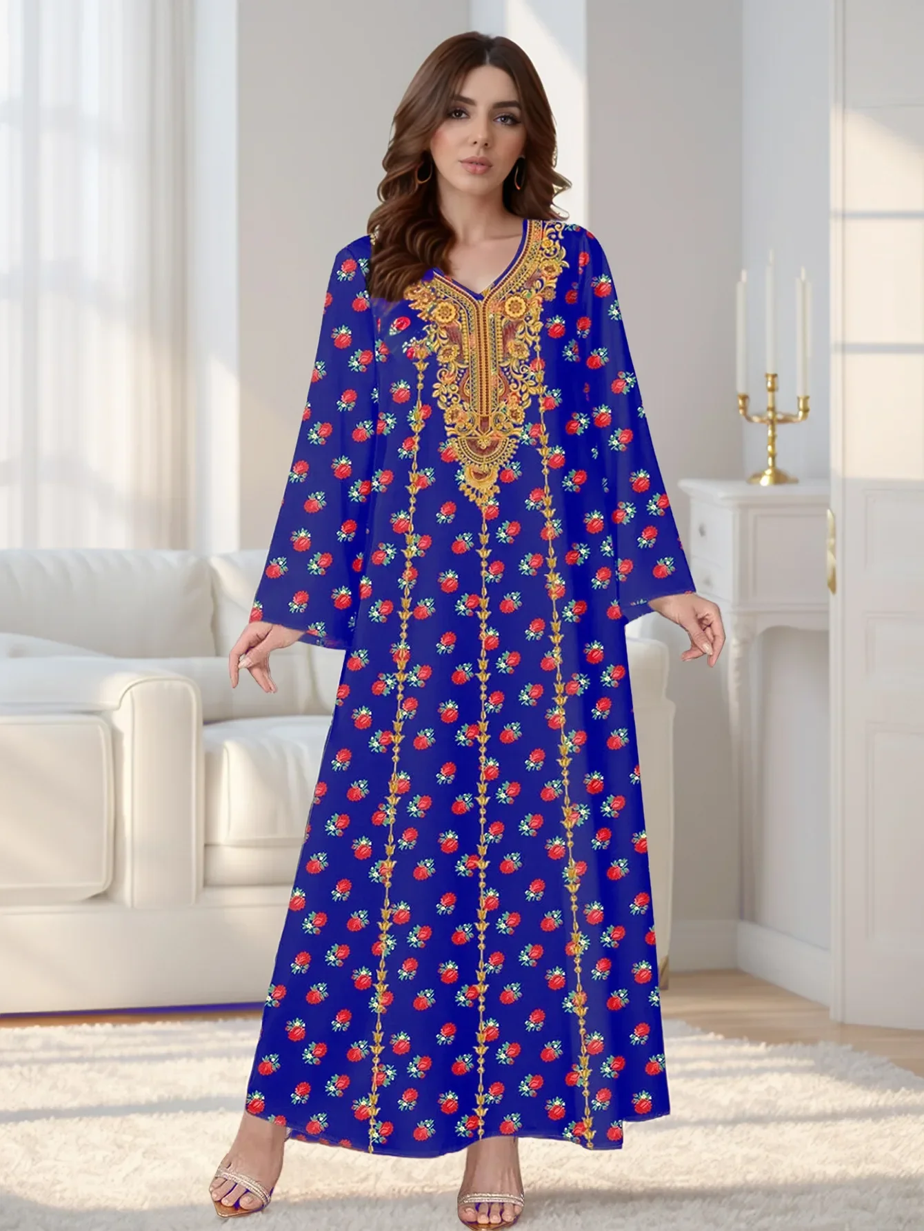 فستان طويل أزرق ملكي بتطريز ذهبي ونقشة ورد