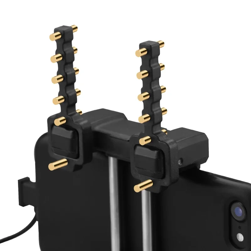 Antenne Yagi pour drone Mini 2, posée à côté de la télécommande, vue arrière.