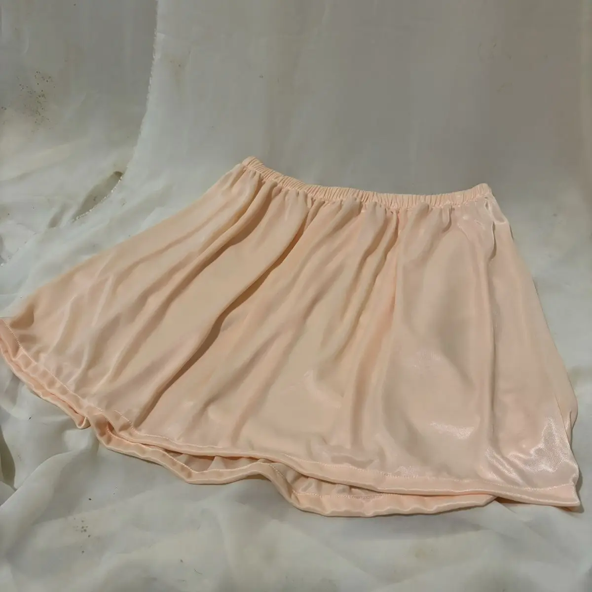 Length 45cm summer glossy see through satin sexy skirt Women a line thin seamless short loose bottoms