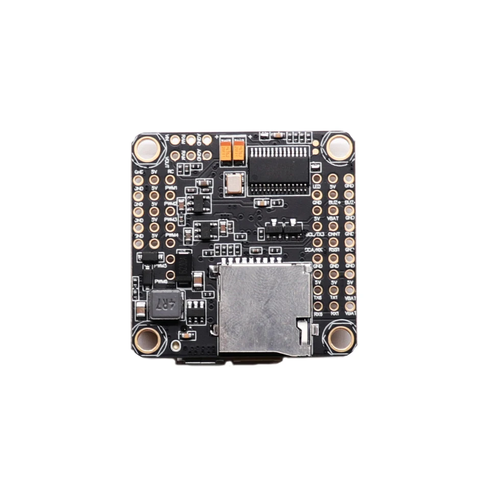 Kit PDB M8N GPS et Flight Controller F4V3S pour drone FPV posé sur une surface, connecté par câbles.