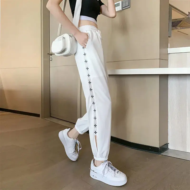 2023 New Summer Fashion Trend Mesh Hollowed Out Print Quick Drying Loose Casual Leggings Thin Cropped Women's Casual Pants