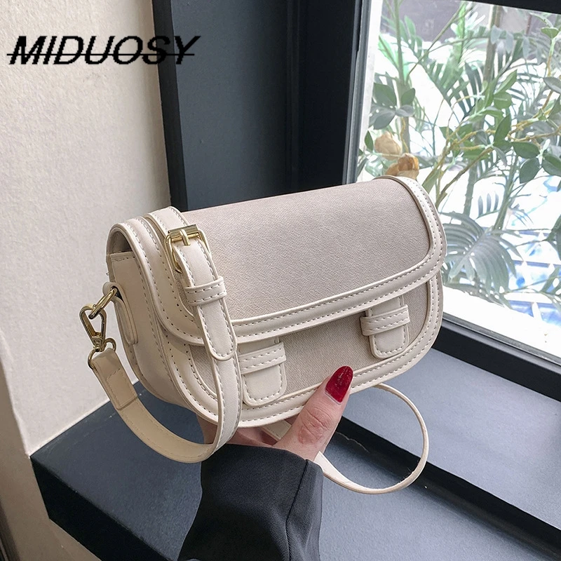 

Niche Fashion Casual Bags Women's 2023 New Solid Color Texture Saddle Bag Commuter's All-Matching Casual Messenger Bag