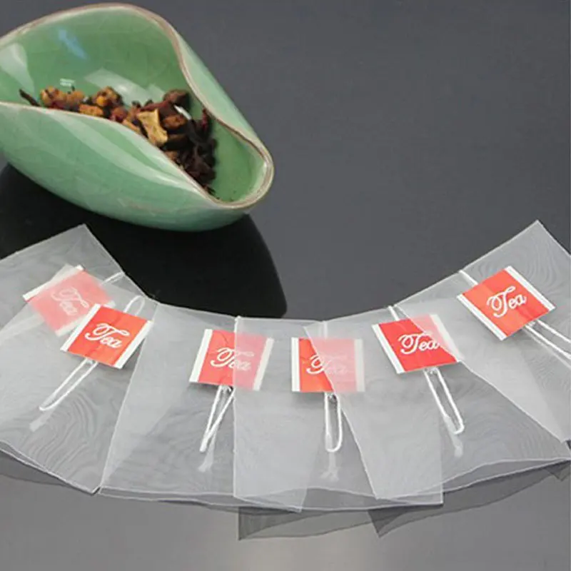 Disposable tea bags 100pcs/lot pyramid tea bags filter nylon teabags single string with label transparent empty