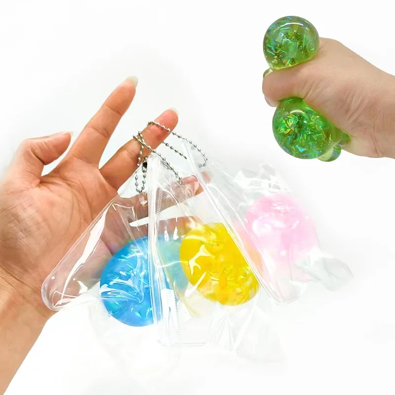 2 pieces of colored random children's stress relief toys golden egg maltose squeezed TPR soft plastic eggs