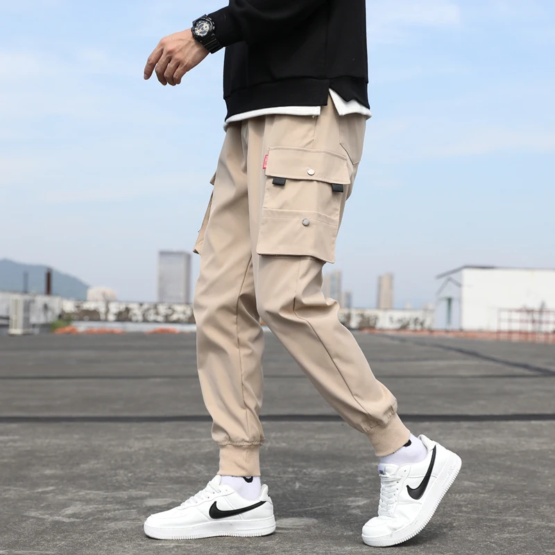Pantalones de mono de Color sólido para hombre a la moda, pantalones de chándal informales sueltos, pantalones deportivos para hombre