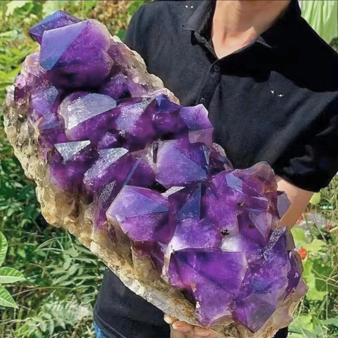 Natural raw amethyst surrounded by a powerful energy magnetic field of healing stone office home decoration crafts