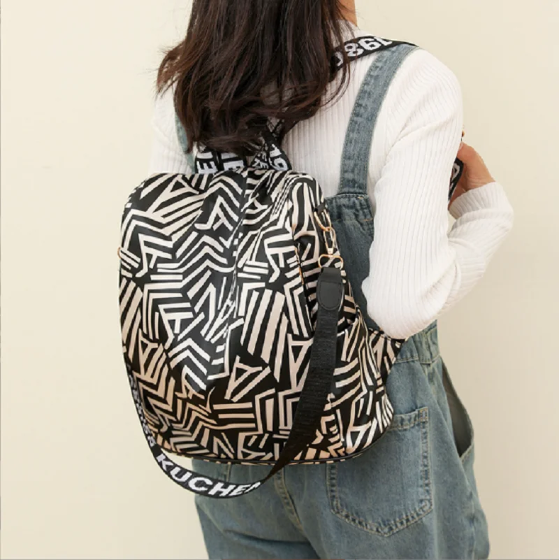 Hot Sale New Fashion Printing Waterproof Nylon Travel Backpack Large Capacity Anti Theft Shoulder Bags Ladies Casual Backpacks