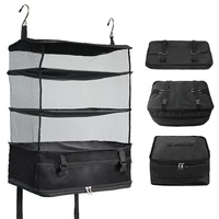 Portable Hanging Travel Luggage Organizer, Foldable Compartment Hanging Wardrobe, Travel Essentials. 1