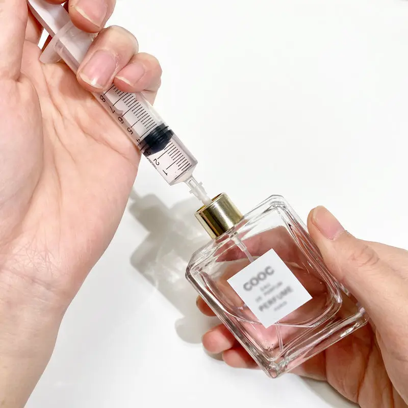 5ml perfume in hand