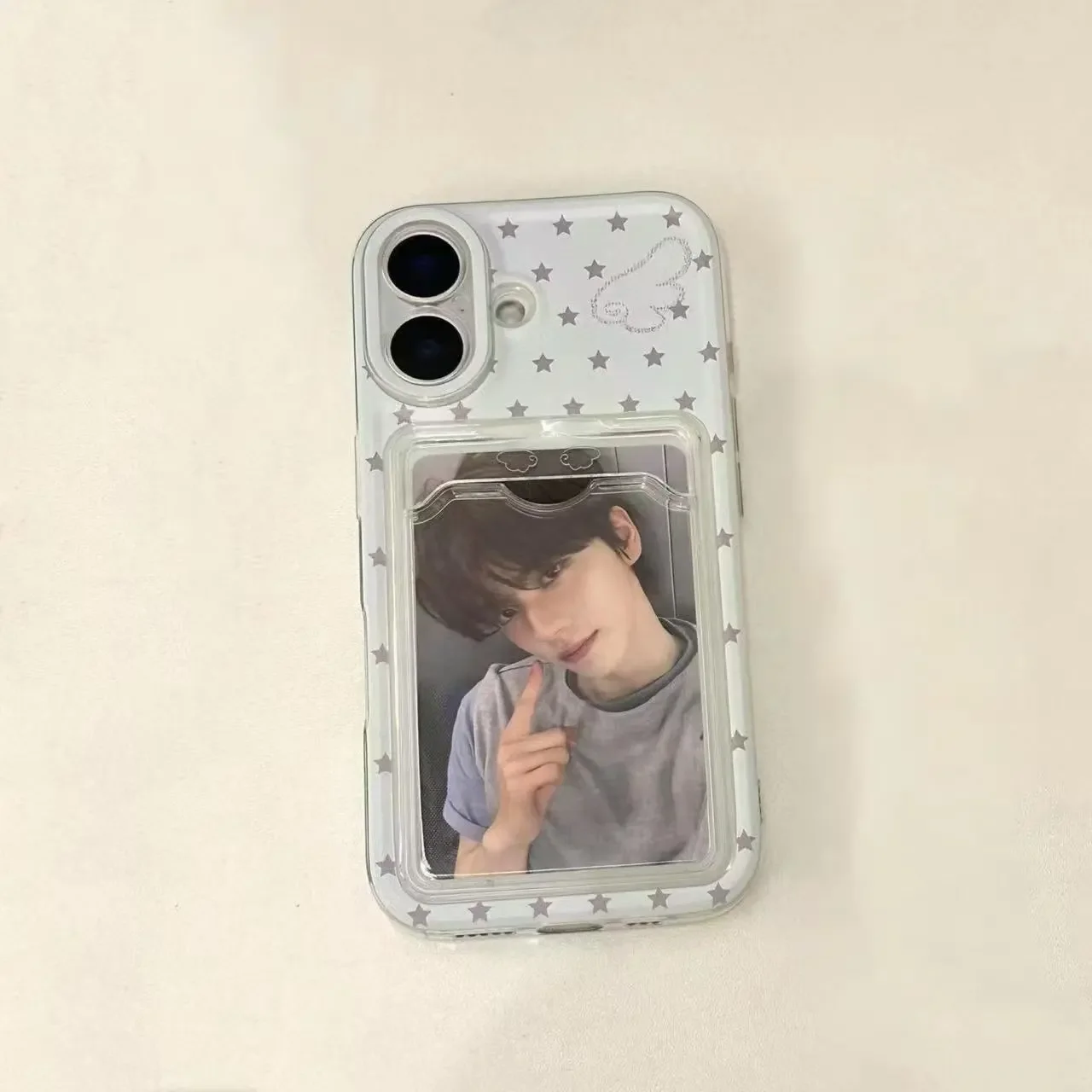 Elegant Black Polka Dot Phone Case with Card Sleeve and White Star Accents