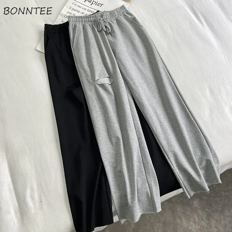 

Брюки женские рваные повседневные спортивные, простая уникальная уличная одежда в Корейском стиле Харадзюку, с завышенной талией, весенние студенческие свободные универсальные шикарные