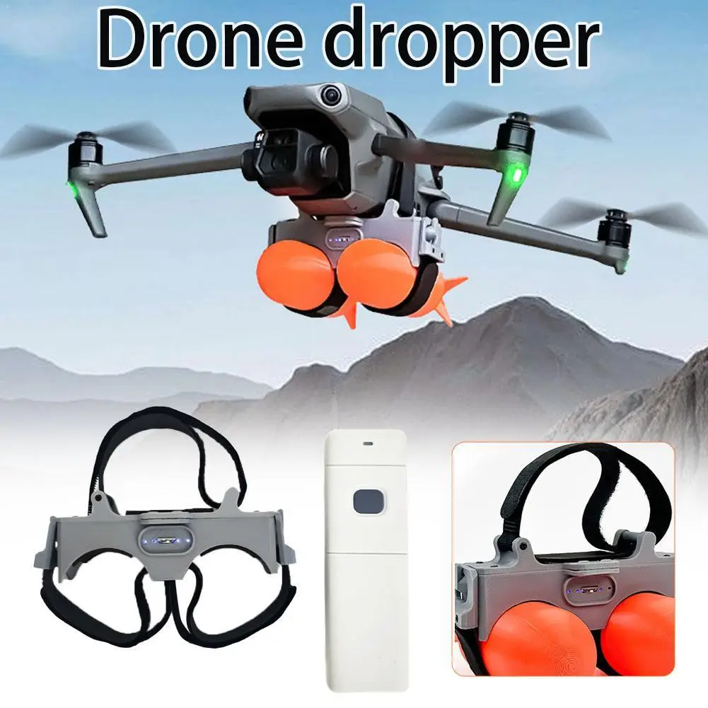 Détail des molettes et boutons du lanceur double commande, compatible DJI Mavic et Autel, avec une main de pilote.