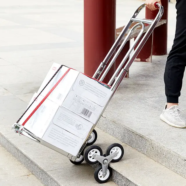 Kézzel Borított Kocsi Felmászó Lépcsőn Felfelé A Hatkerekű Háztartás Összecsukása - Image 4