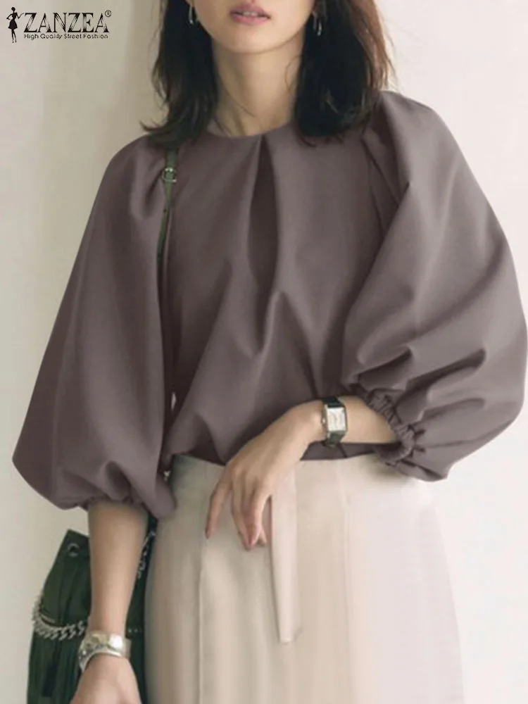 

Женская блузка с рукавами-фонариками, круглым вырезом