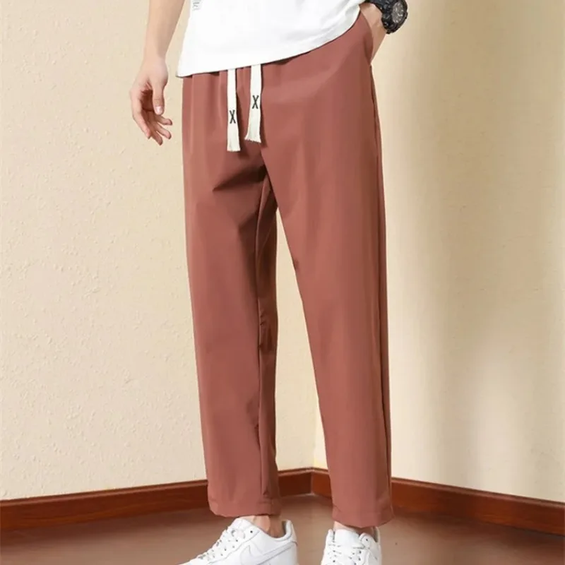 Men's Spring Summer Solid Pockets Drawstring Bandage Elastic High Waisted Casual Sports Small Leg Trousers Preppy Style Pants