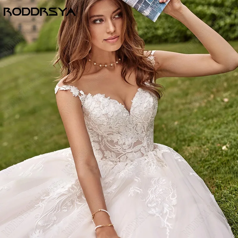 RODDRSYA Beach Cap Sleeves Wedding Dresses Illusion Lace Buttons Back Bridal Gown Women Appliques Tulle vestidos de novia playa