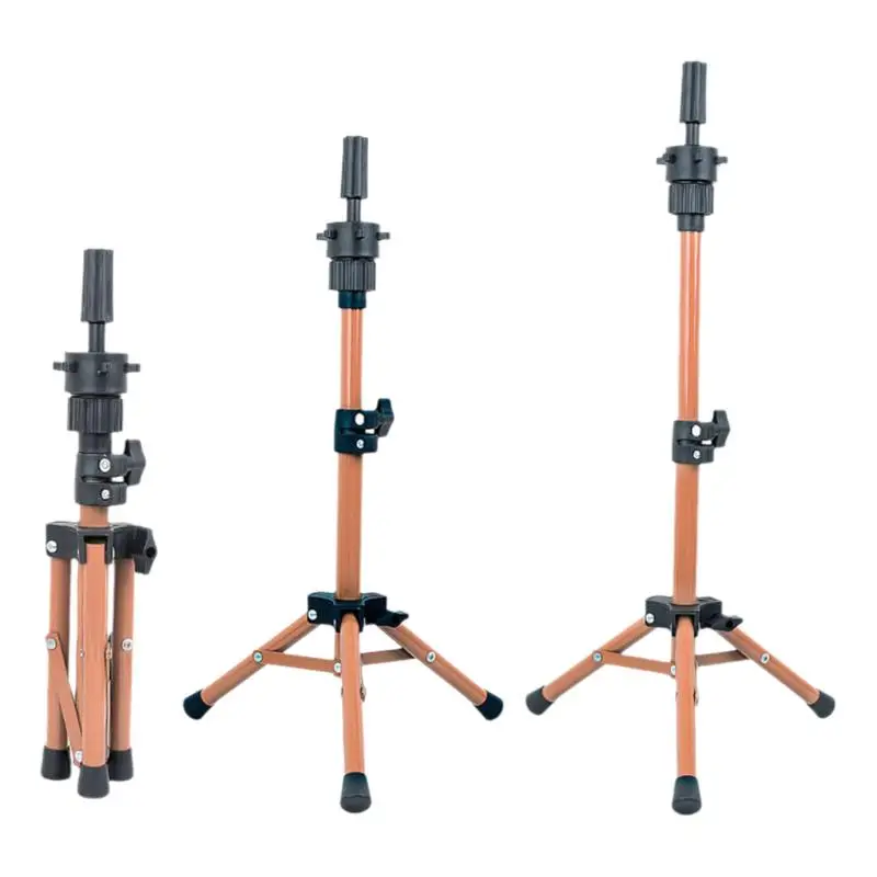 조절 가능한 가발 연습 스탠드, 견고한 금속 삼각대가 마네킹 머리를 어떤 각도에서도 쉽게 스타일링할 수 있도록 견고하게 고정합니다.