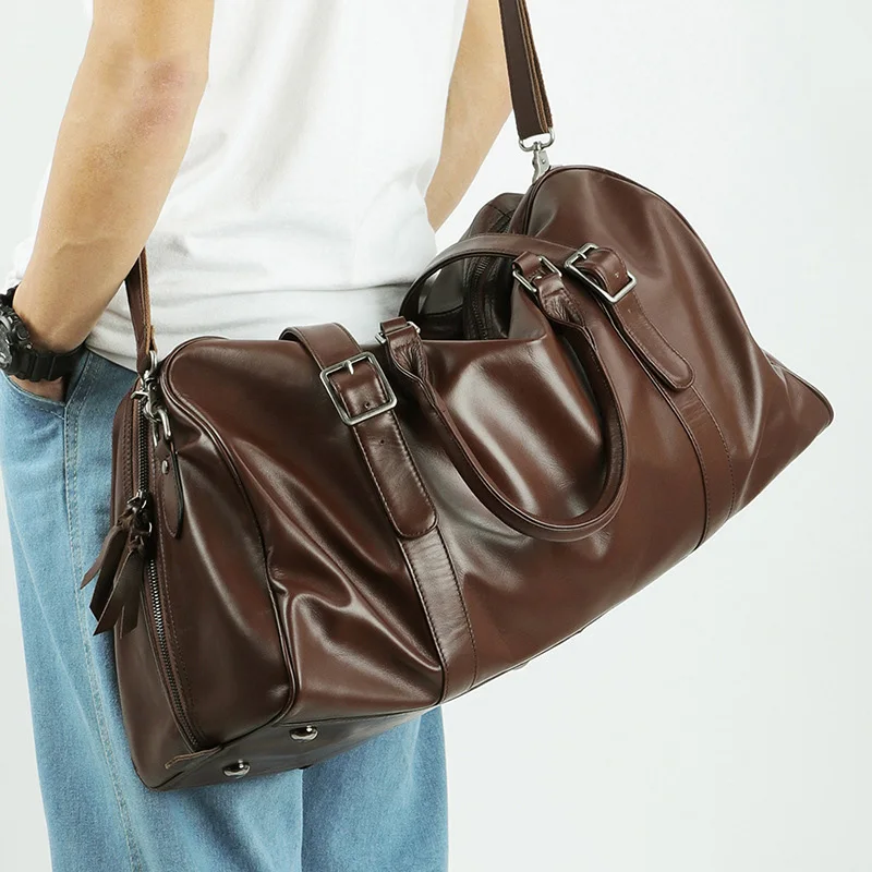 

Newsest design leather men's bag duffel bag sports gym bag large capacity carry on travel bag casual single shoulder luggage bag