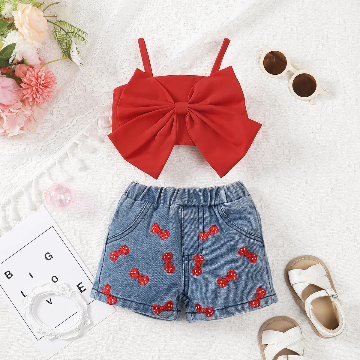 

0-24M Baby Girl Solid Color Pit Strip Tie Sling Big Bow Top with Floral Shorts Three-Piece Suit，Suitable for Summer Wear