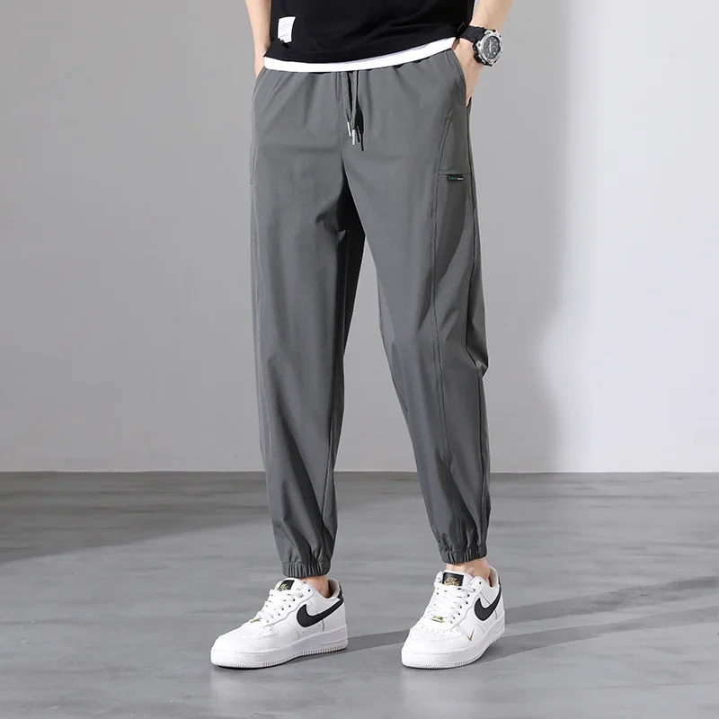 Spring and Autumn Men's Elastic High Waist Solid Pocket Drawstring Harlan Casual Sports Shrink Trousers Office Lady Pants