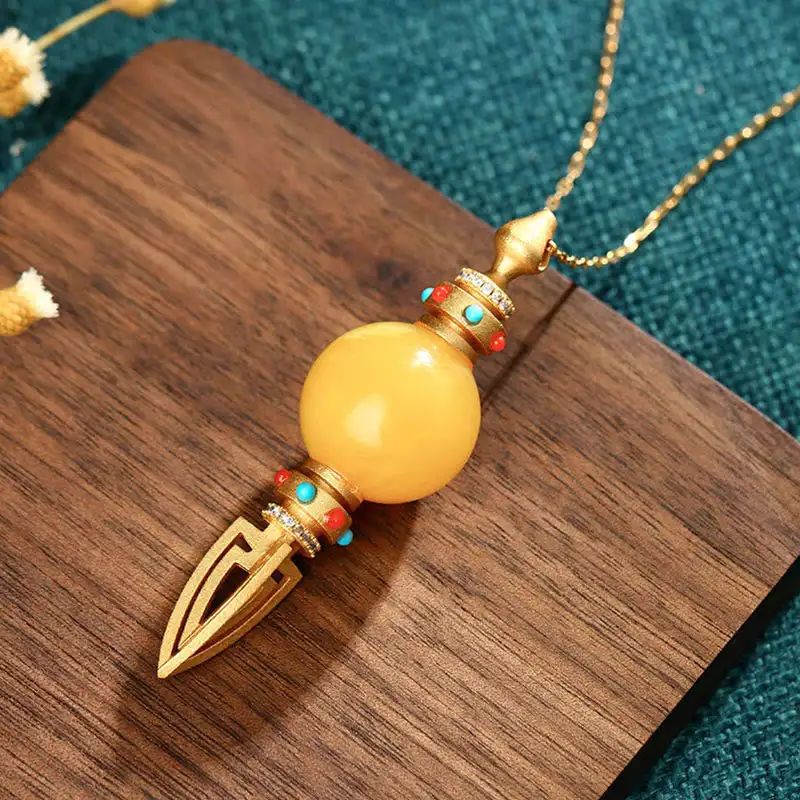 

Buddha Stones 24K Gold Plated Amber Dorje Vajra Clear Anxiety Necklace Pendant