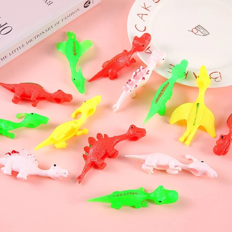 

5Pcs Catapult Dinosaur Fun Toys Cartoon Animal Finger Launch Game Tricky Slingshot Stress Relief Toys Kid Party Favors Gifts