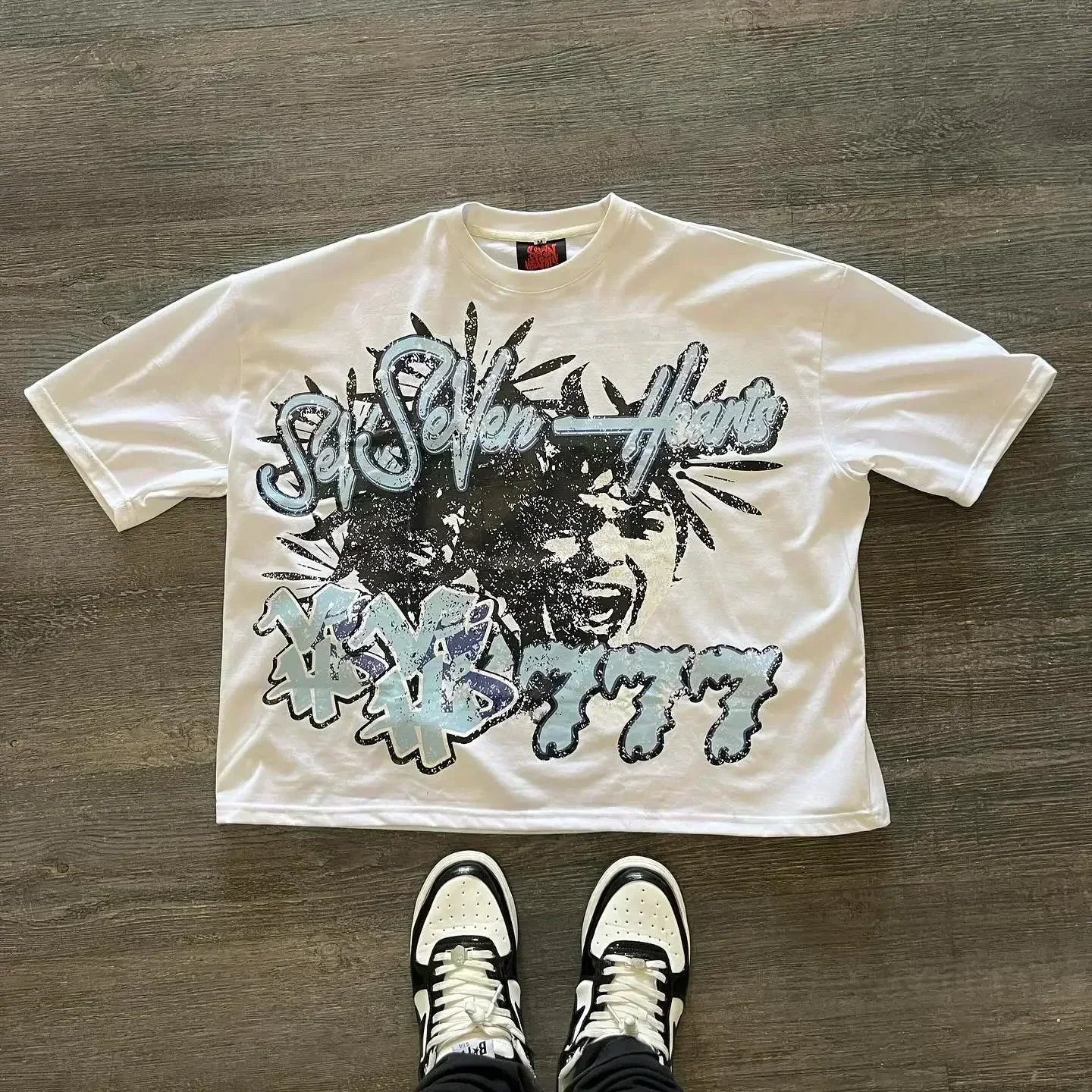 thumbnail image 1 of Camisetas con estampado gráfico de letras de calle retro americanas estilo hip hop, camisetas Y2k de gran tamaño para parejas, ropa gótica Harajuku para hombres y mujeres, 1 of 5