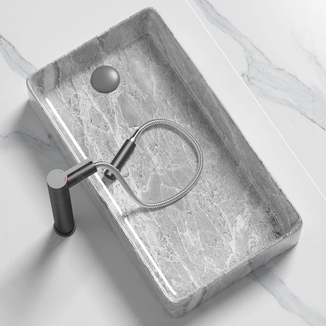 อ่างล้างหน้าเซรามิกดีไซน์หรูทันสมัยสำหรับห้องน้ำ อ่างล้างหน้าแบบวางบนเคาน์เตอร์พร้อมอุปกรณ์ระบายน้ำ 3