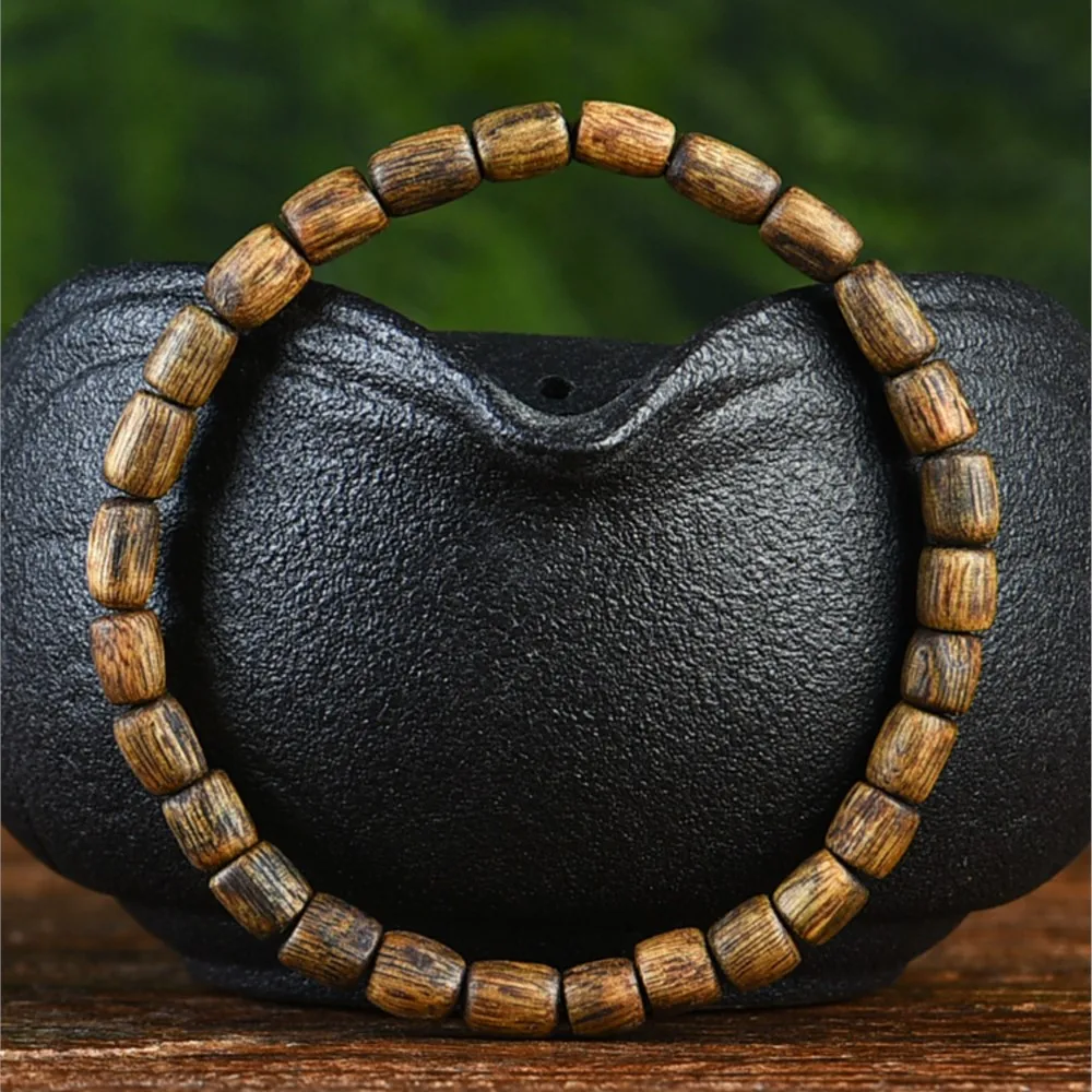 

Hainan National Incense Qi Nan Agarwood Bracelet about 5mm Men's and Women's Matching Drum Beads Wenwan Wooden Bracelet