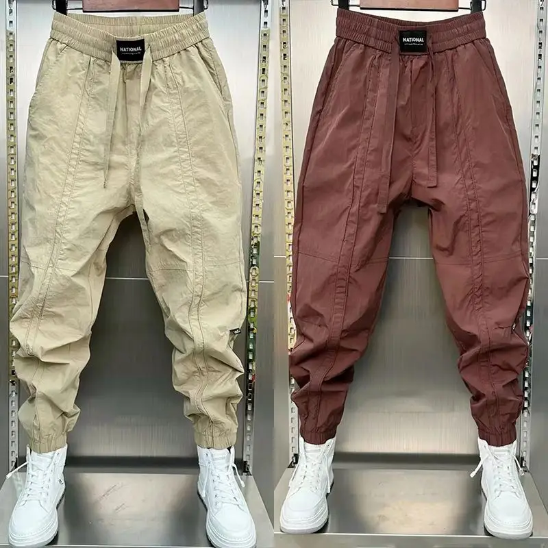 Spring Summer New Solid Color Fashion Elastic Waist Ankle Length Pants Man High Street Pockets Drawstring Patchwork Trousers